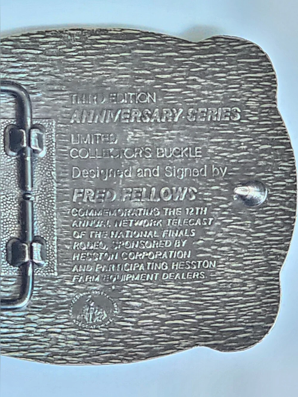 Vintage 1985 Hesston Belt buckle National Finals Rodeo Fred Fellows Design